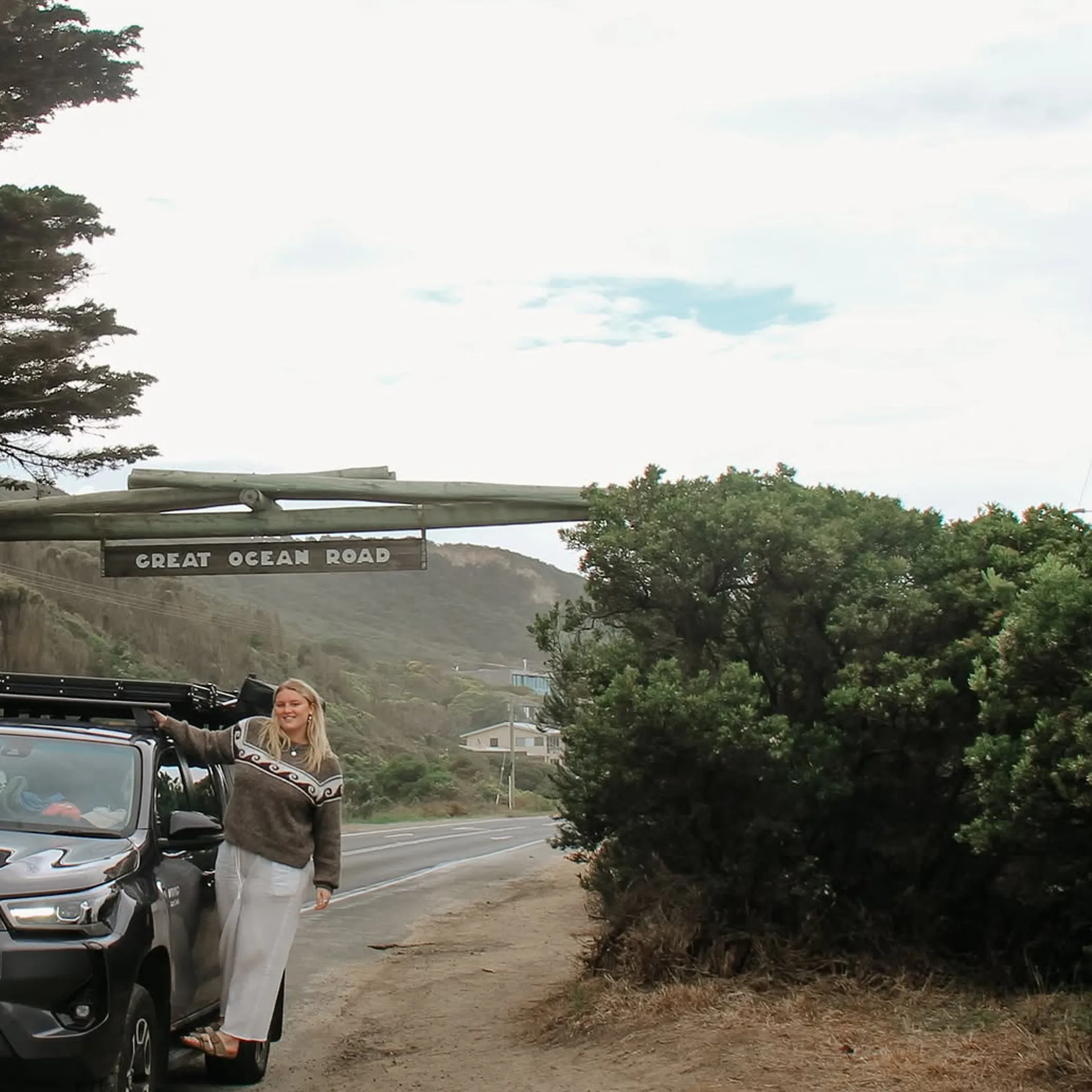 family driving on scenic road trip