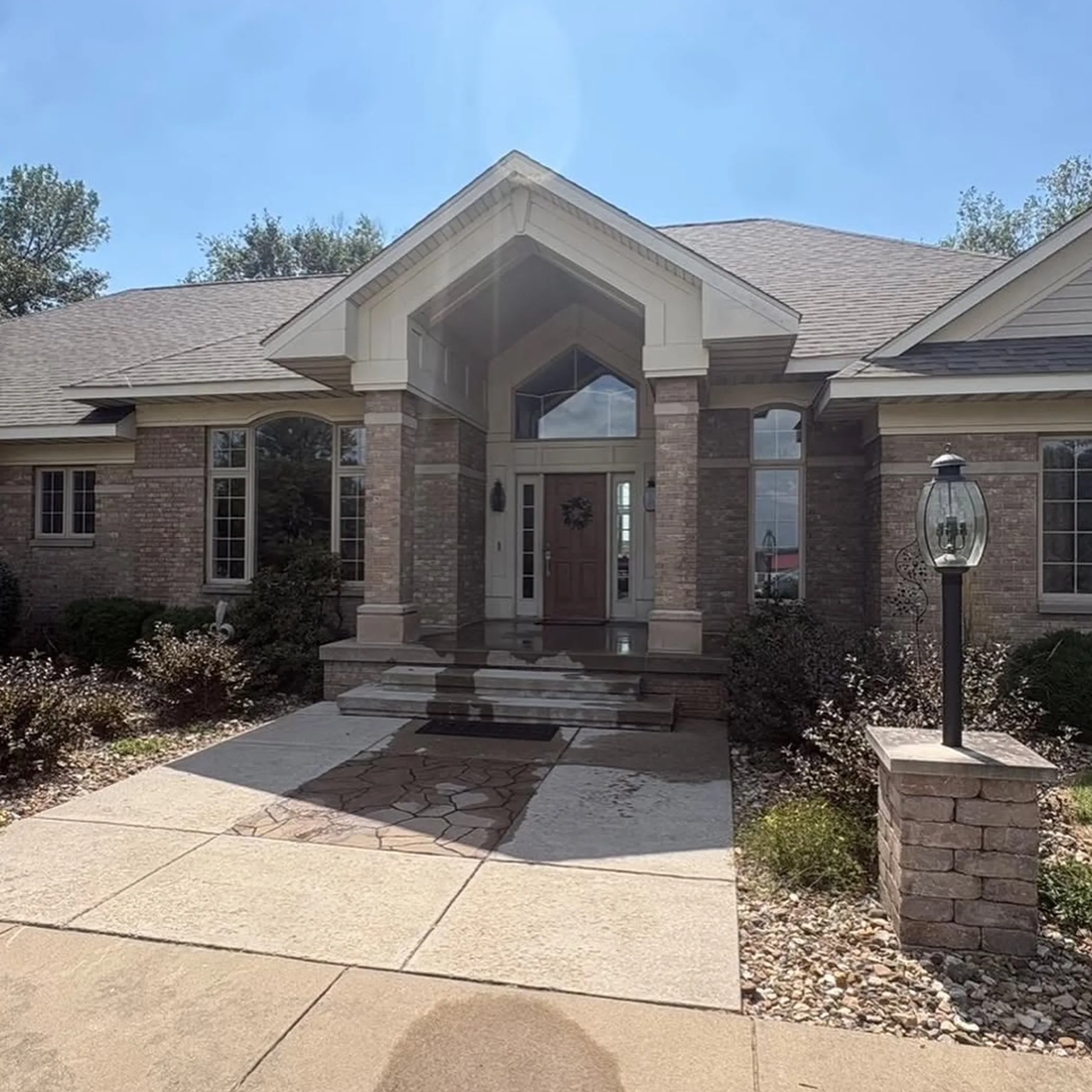 home exterior with windows and gutters